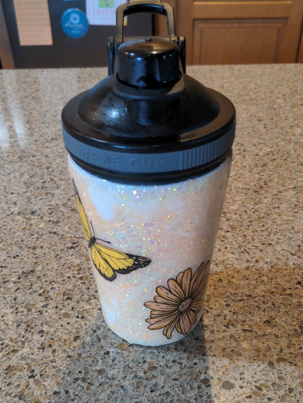 Glitter Butterfly Shaker Cup with Yellow Floral Accent